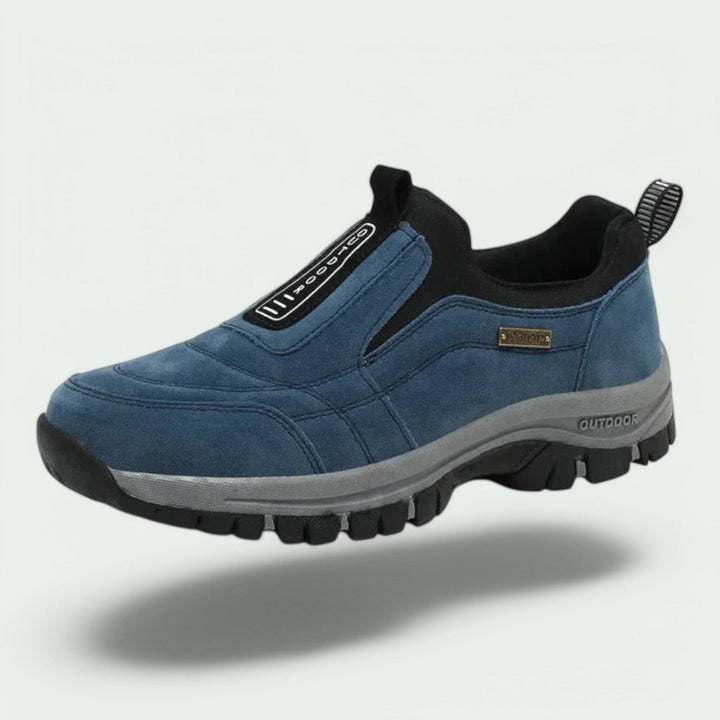 Μπλε ορθοπεδικό sneaker με ταμπελάκι στο πλάι και μαύρη σόλα